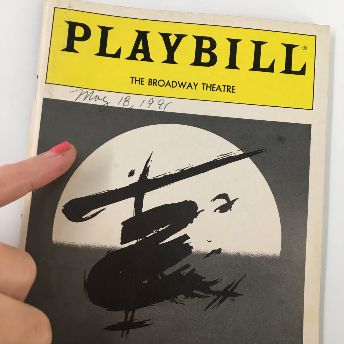Close-up of the 1991 Playbill for Miss Saigon from The Broadway Theatre, highlighting the cover and handwritten date of May 18, 1991.