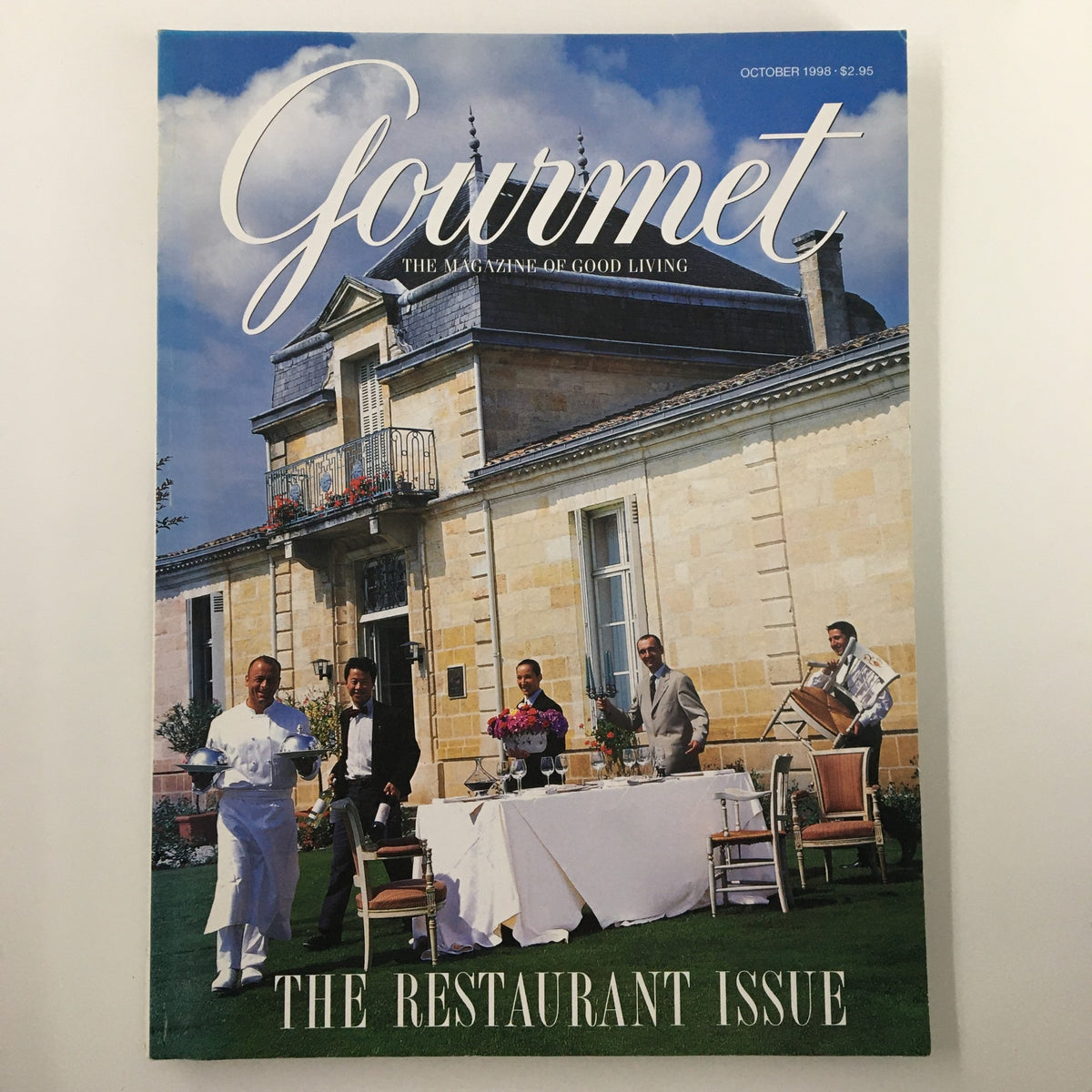 Gourmet Magazine October 1998 cover featuring Chef Thierry Marx leading an exuberant crew preparing a restaurant setting outdoors, showcasing vintage culinary artistry.