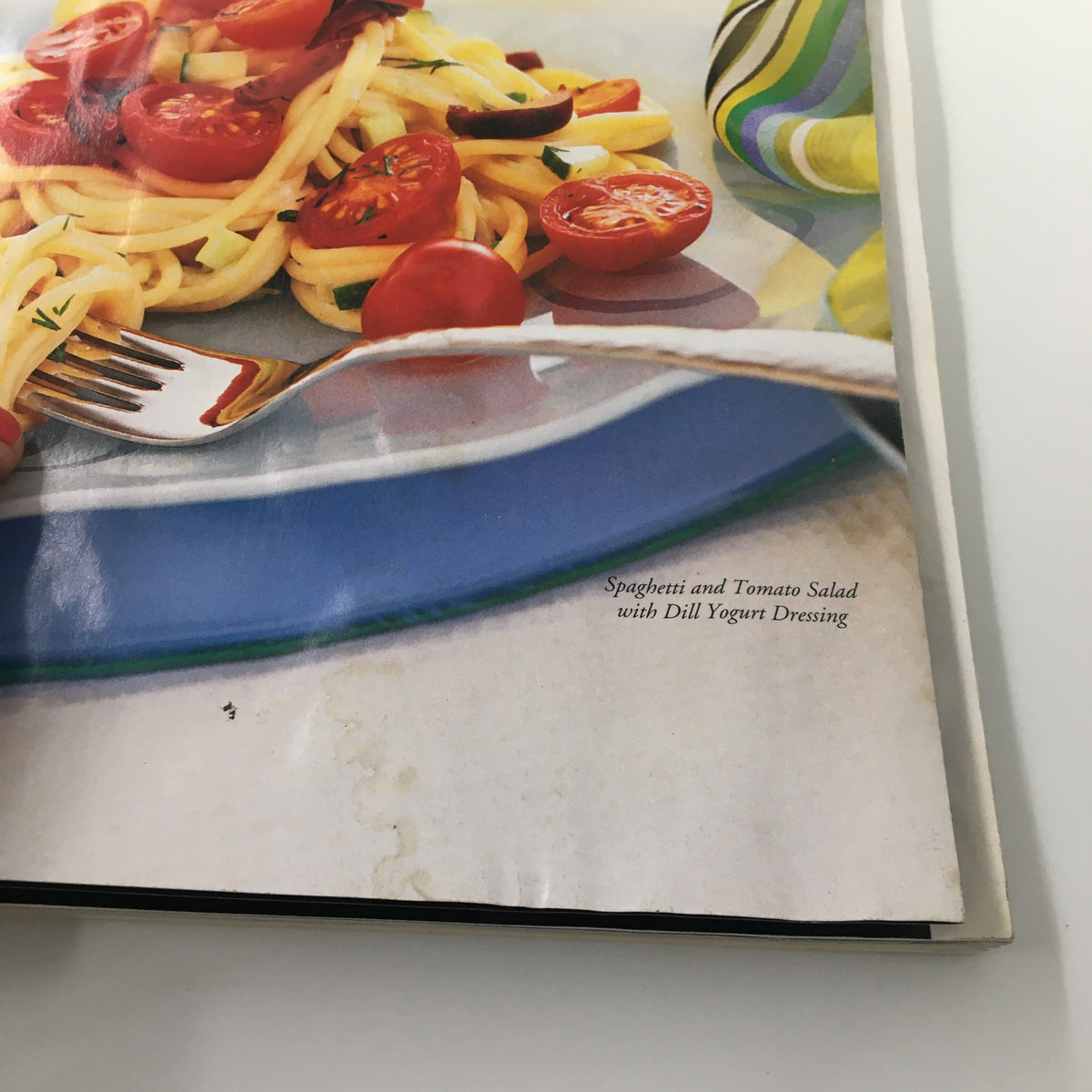 Interior view of Gourmet Magazine June 1997 showcasing Spaghetti and Tomato Salad with Yogurt, focusing on the dish presentation and magazine layout.