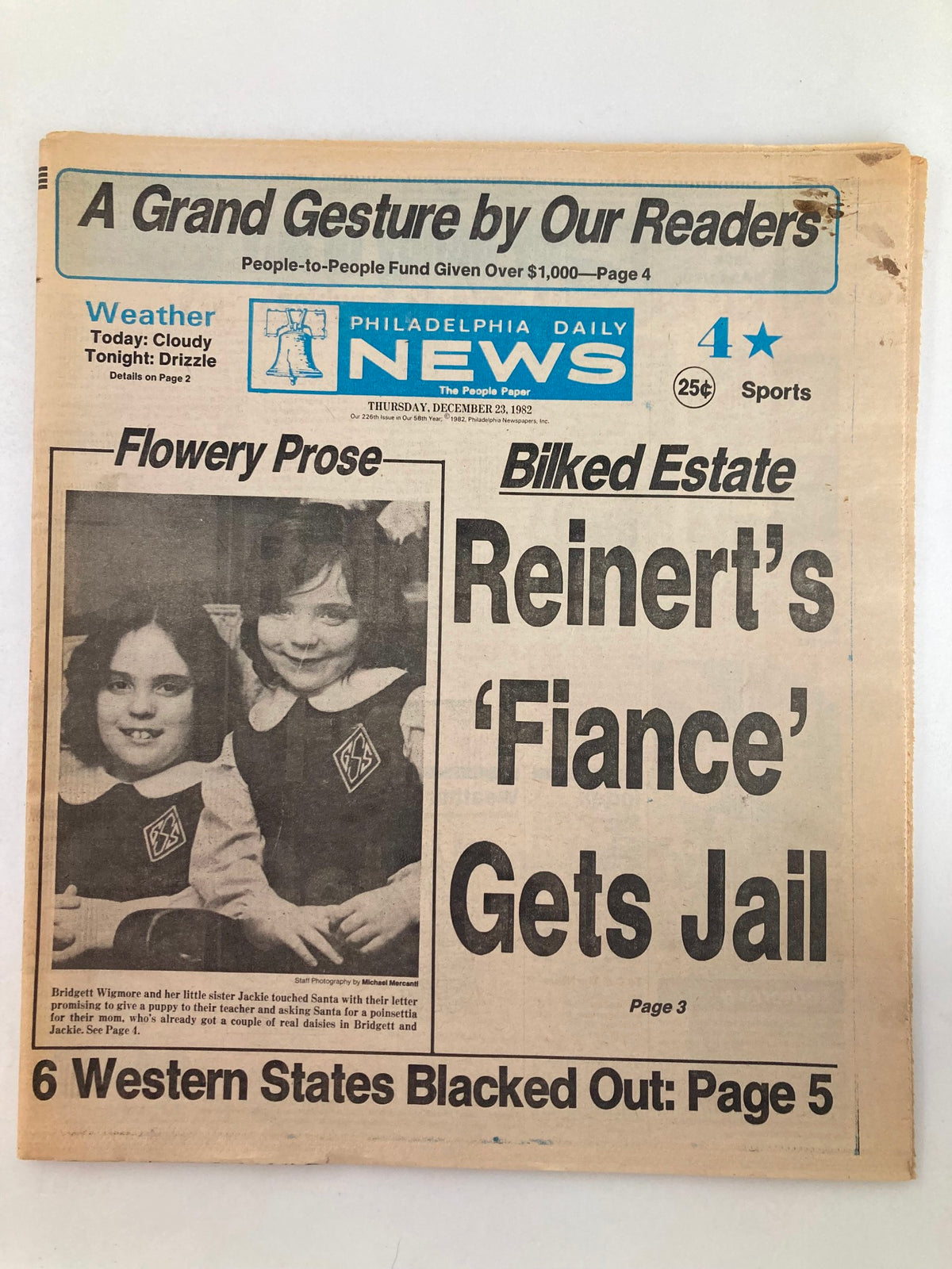 Philadelphia Daily News Tabloid December 23 1982 featuring an article titled 'Reinert's Fiancé Gets Jail' along with images of children; good condition with minor wear.