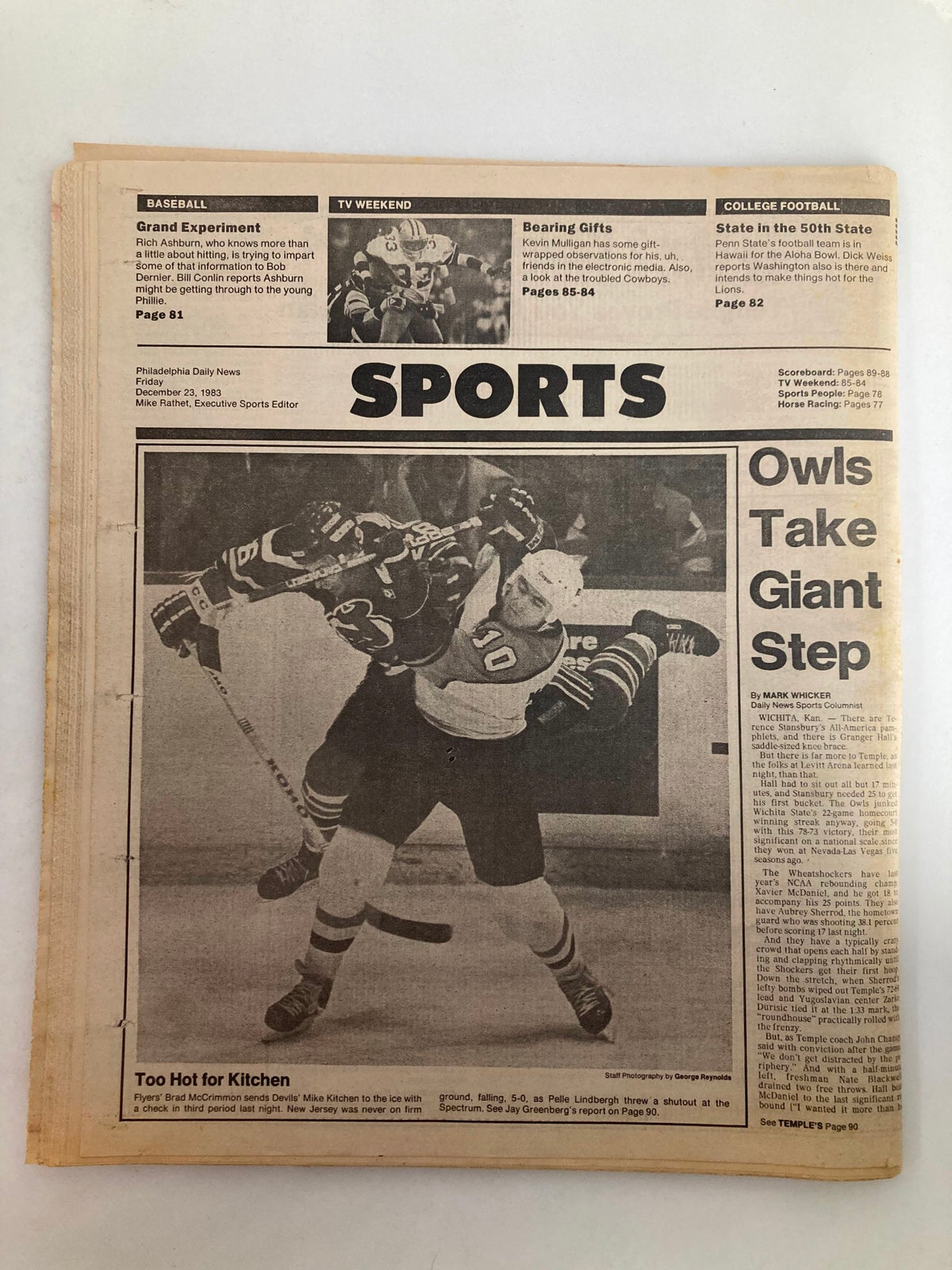 Philadelphia Daily News Tabloid December 23, 1983 - Trina & Eddie Season of Love back cover highlighting sports news and a hockey image, emphasizing the tabloid's cultural significance during the early 80s.