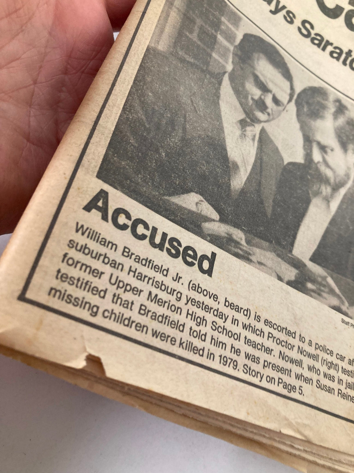 Close-up of the Philadelphia Daily News Tabloid dated April 29, 1983. This excerpt highlights William Bradfield Jr., who is identified as the accused, along with details about the case involving missing children.