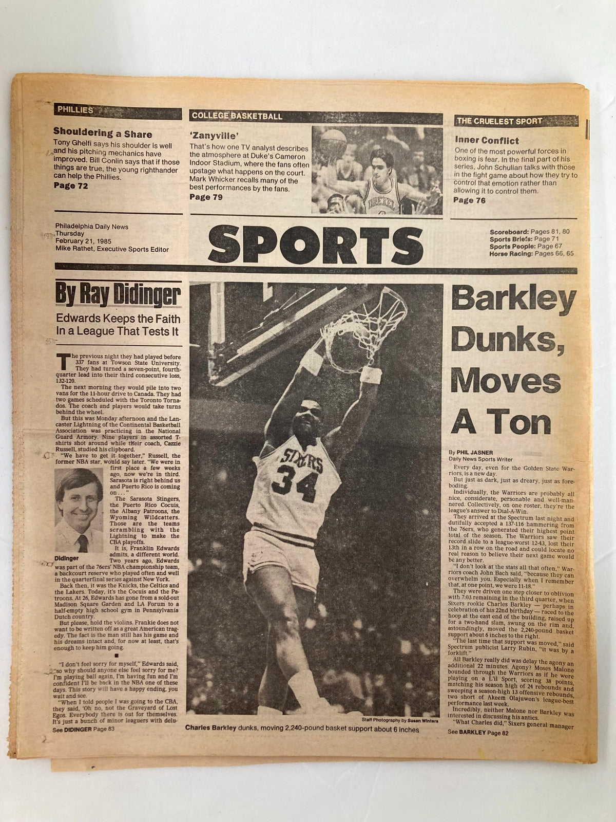 February 21, 1985 Philadelphia Daily News tabloid featuring prominent sports news including a headline on Charles Barkley dunking, along with commentary by Ray Didinger, showcasing the Philadelphia 76ers and college basketball highlights.
