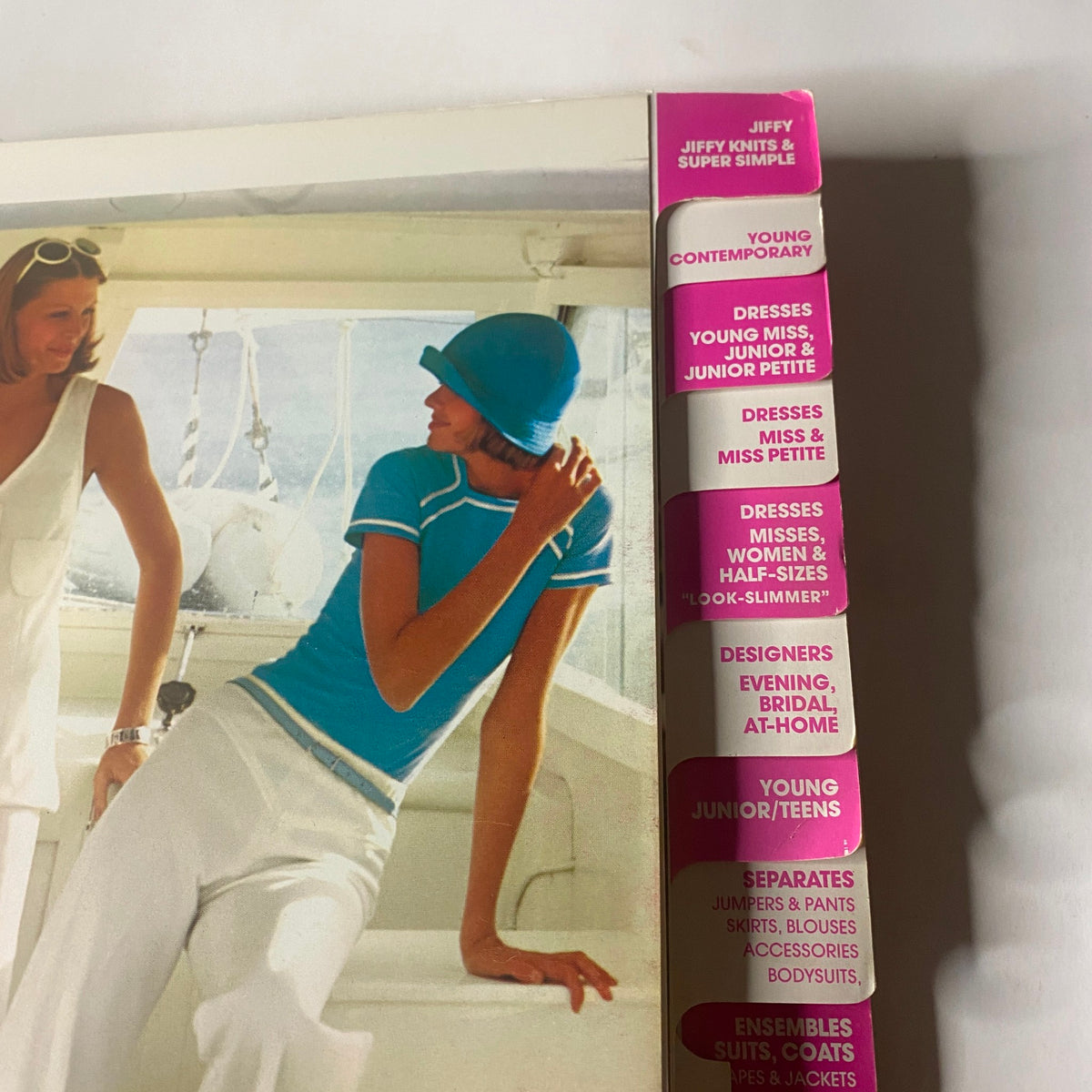 Cover side of the 1973 July Simplicity Catalog highlighting various sewing categories such as 'Jiffy', 'Young Contemporary', and 'Dresses for all sizes'.