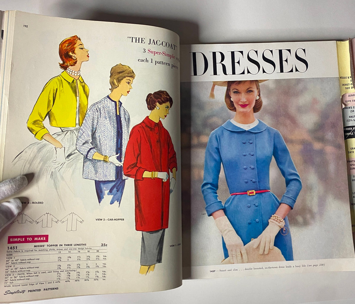 Interior page of the 1956 May Simplicity Sewing Pattern Catalog featuring styles of dresses, including casual and formal options, reflecting mid-century elegance.
