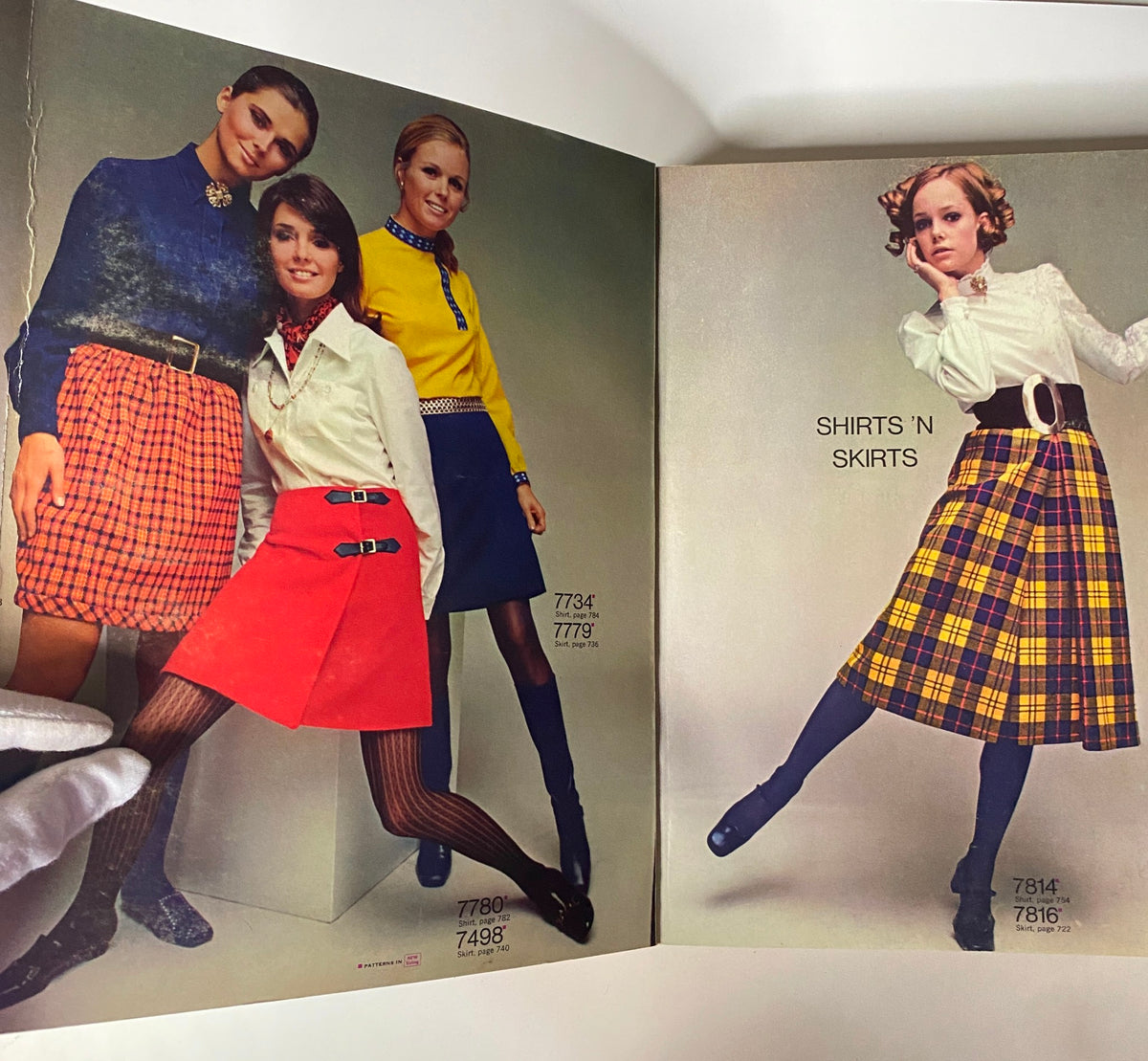 1968 September Simplicity Catalog showcasing models in vintage fashion, including skirts and tops with bold colors and patterns, representing late 1960s style.