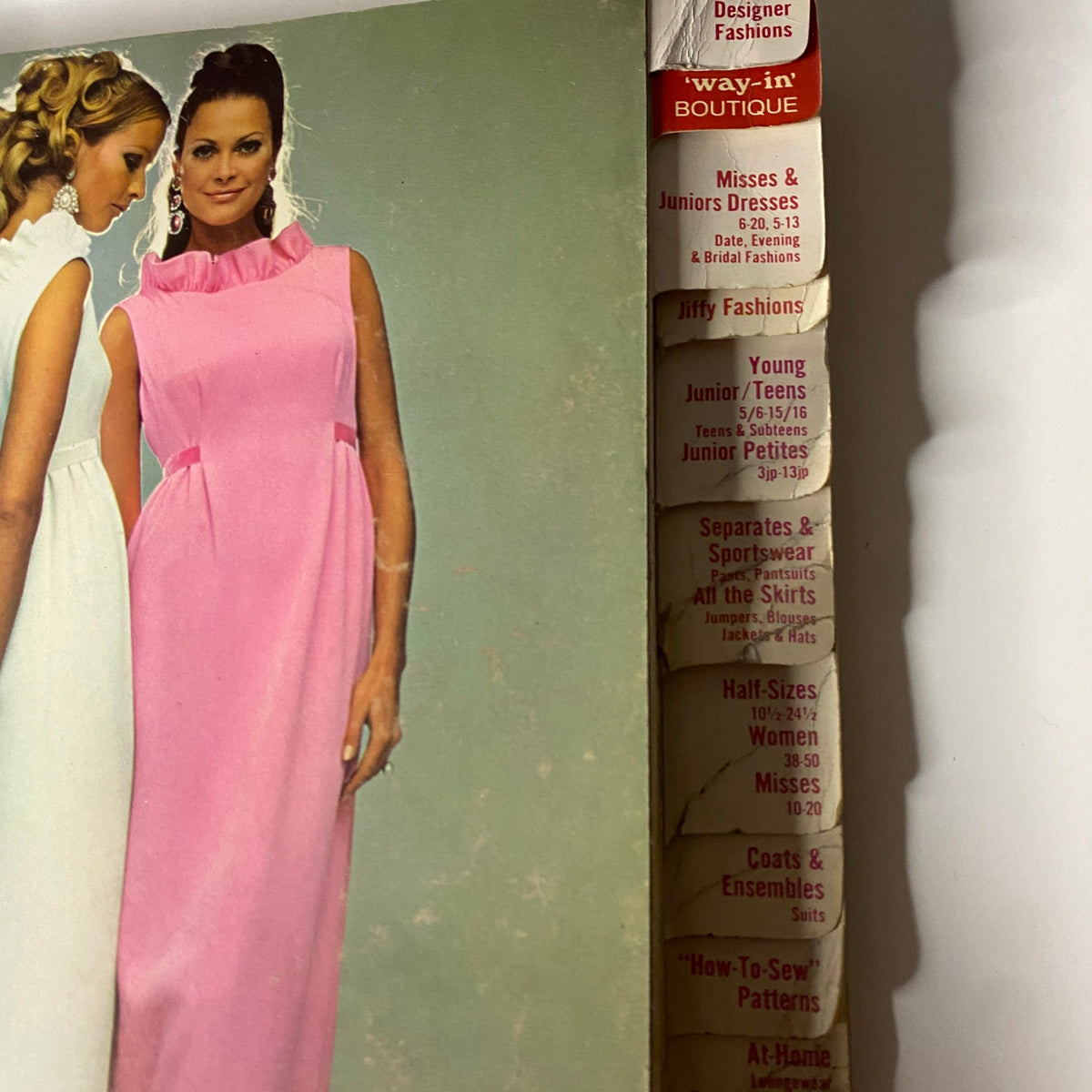 1968 December Simplicity Catalog Sewing Pattern highlighting the contents with a pink dress and additional sewing options listed on the side, reflecting fashion highlights from the late 1960s.