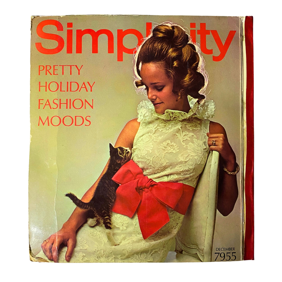 1968 December Simplicity Catalog showcasing a vintage cover image with a model in a holiday dress design, perfect for fashion and sewing history enthusiasts.