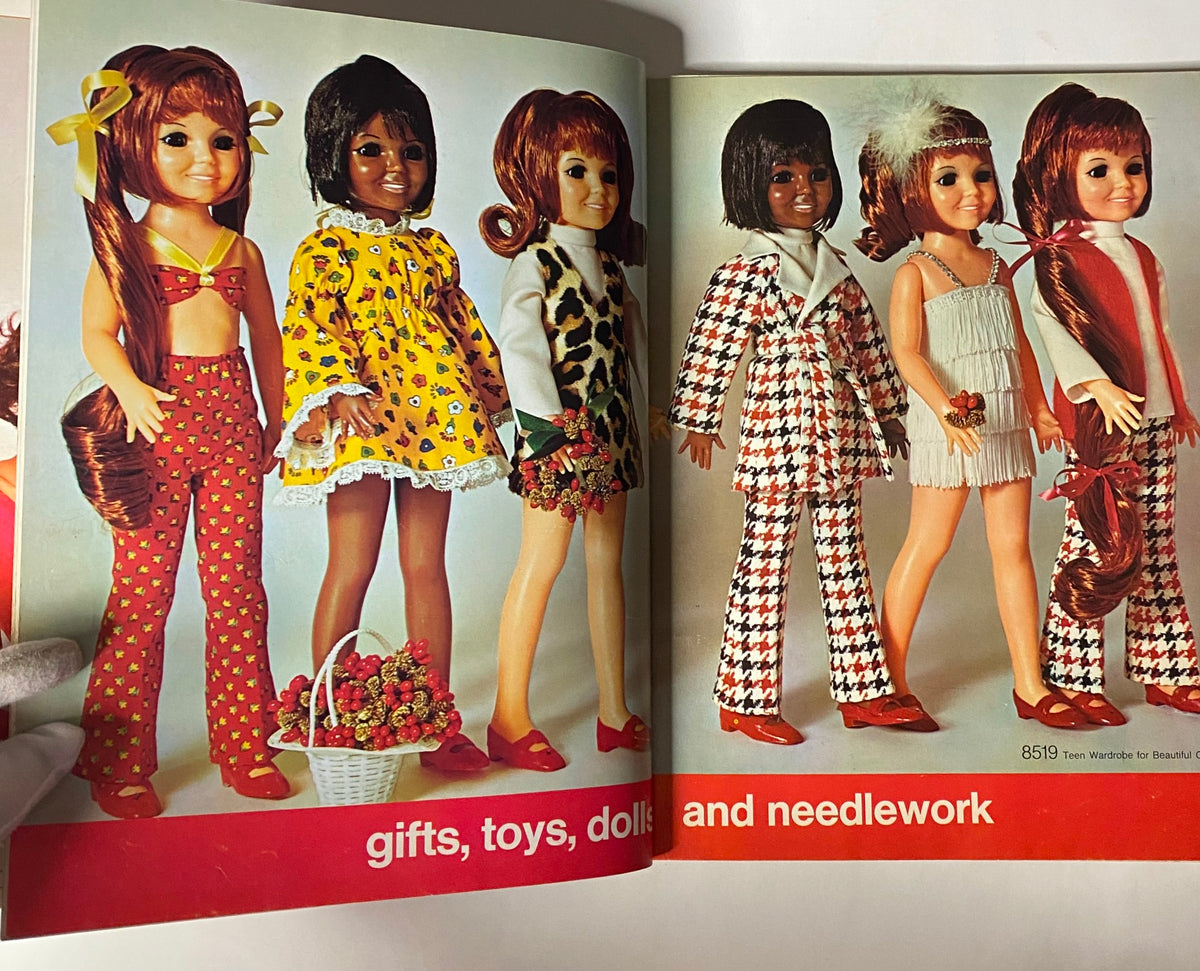 1969 Simplicity Holiday Catalog showcasing dolls dressed in vibrant outfits under 'gifts, toys, dolls and needlework' section.