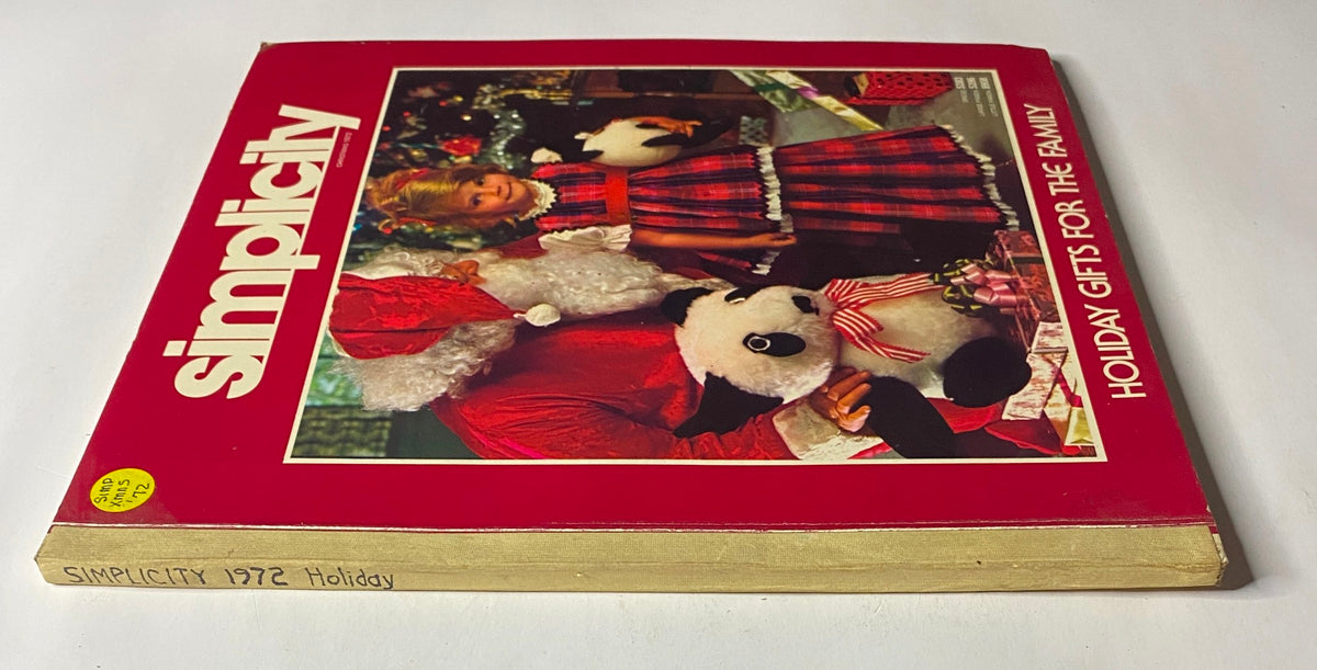 Cover of the 1972 Simplicity Holiday Catalog featuring Santa Claus and a young girl in a plaid dress, promoting holiday gifts for the family.