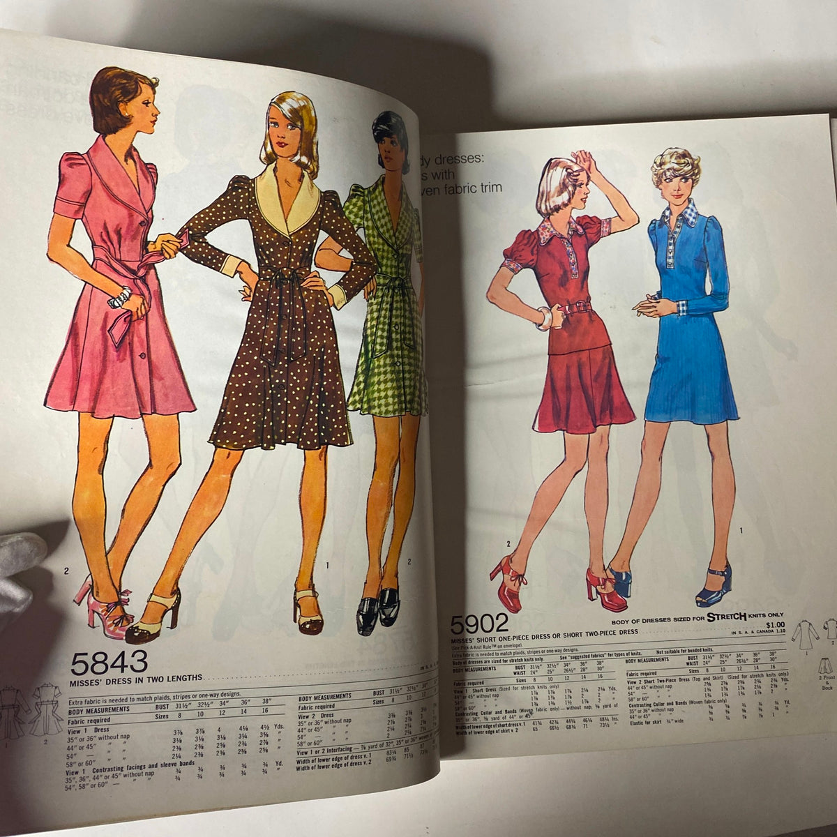 1973 January Simplicity Catalog showcasing Misses' dress patterns in different designs, including variations with collars and belts for all ages.