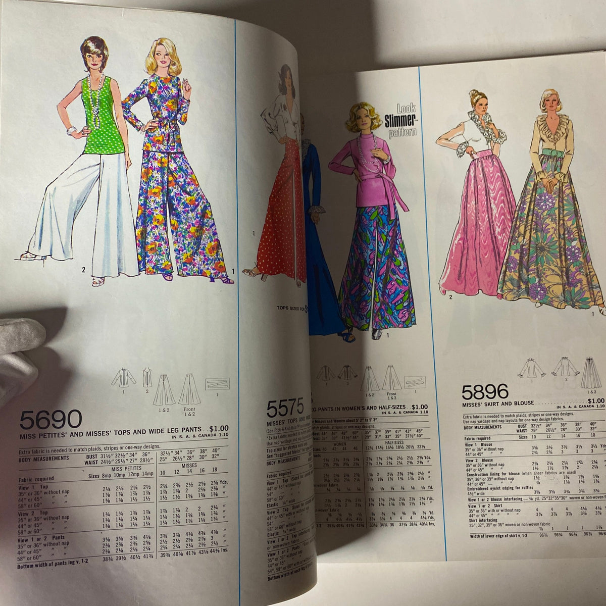 1973 January Simplicity Catalog showcasing sewing patterns for Miss Petites, Misses' tops and pants. Features fashionable designs including wide-leg pants and stylish tops with pattern details.