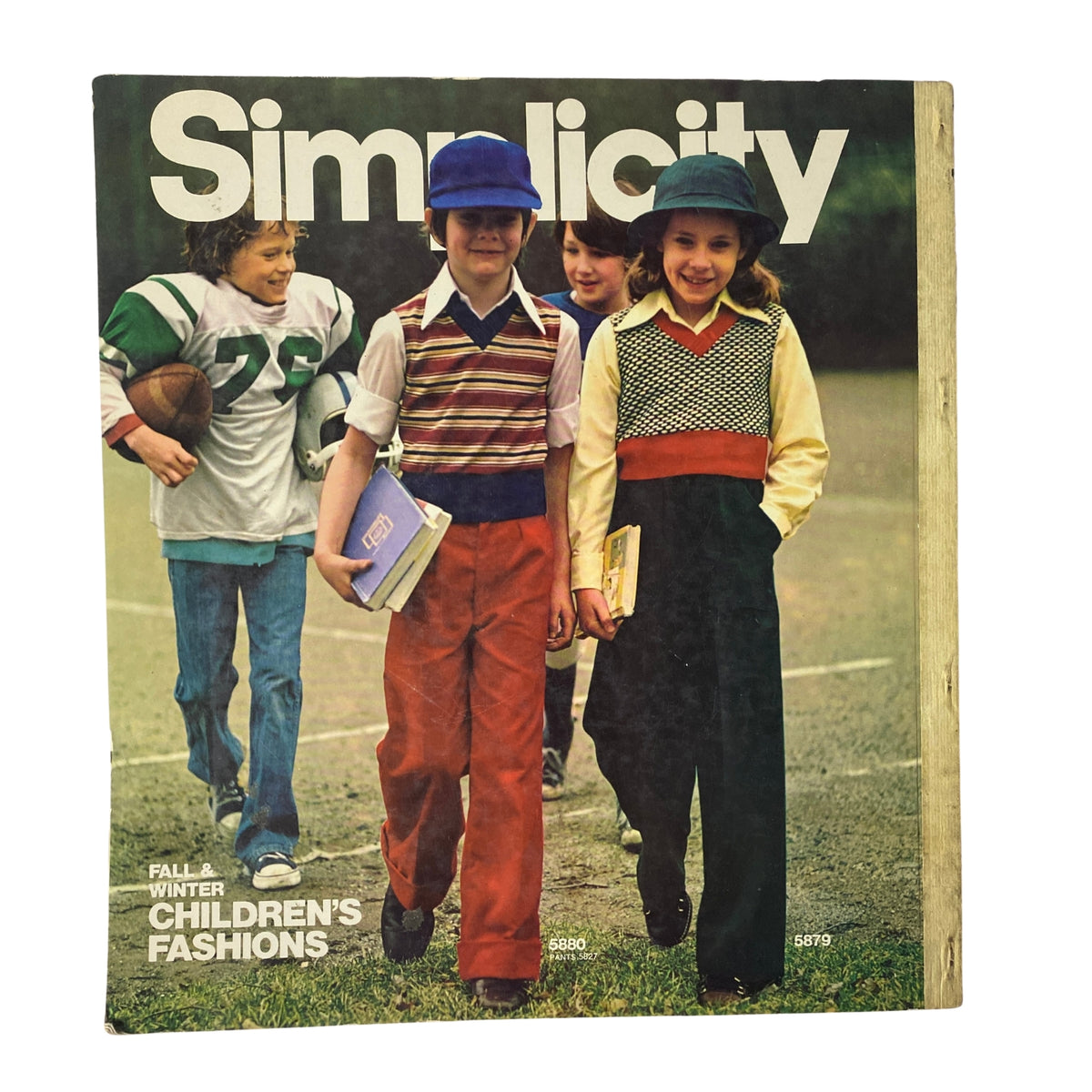 1973 Simplicity Fall and Winter Catalog cover showcasing children dressed in classic 1970s style, featuring a fall and winter children's fashion theme.