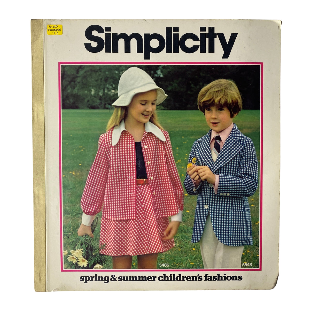 Cover of the 1973 Simplicity Spring and Summer Catalog featuring children in vibrant outfits, showcasing timeless children's fashion.