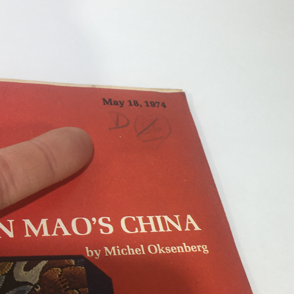 Detail of the May 18, 1974 Vintage Saturday World Review cover, highlighting the title 'The Power Scramble in Mao's China' by Michel Oksenberg, with a finger pointing at the date.