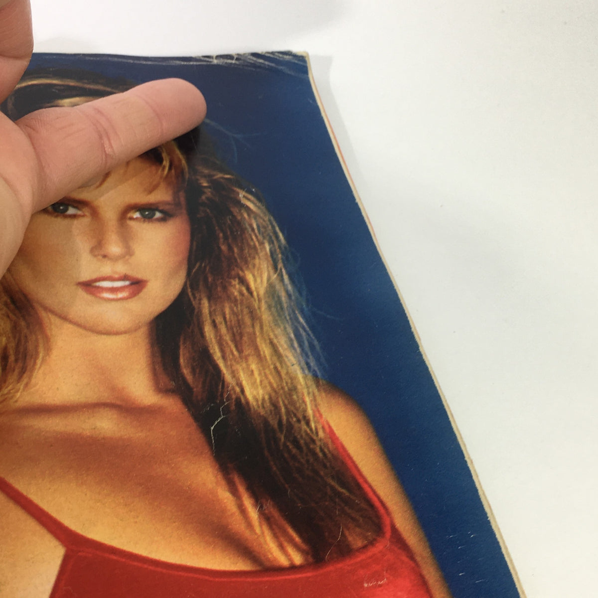 Close-up of the February 1982 VTG Life Magazine cover featuring Christie Brinkley, showcasing her iconic look in a red outfit against a blue background, highlighting the glamour of the early 1980s.