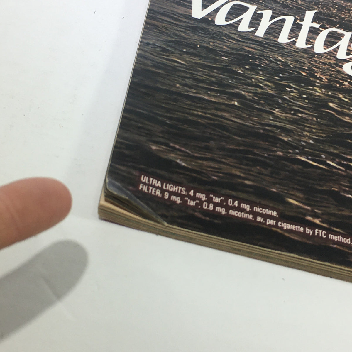 Close-up detail of the bottom corner of the advertisement in VTG Life Magazine, displaying product details for Vantage cigarettes.