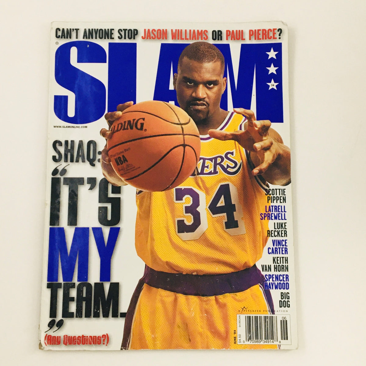 Slam Magazine June 1999 cover featuring Shaquille O'Neal in a Lakers jersey, showcasing basketball culture. This collectible issue includes Scottie Pippen and more NBA stars, a must-have for sports enthusiasts.