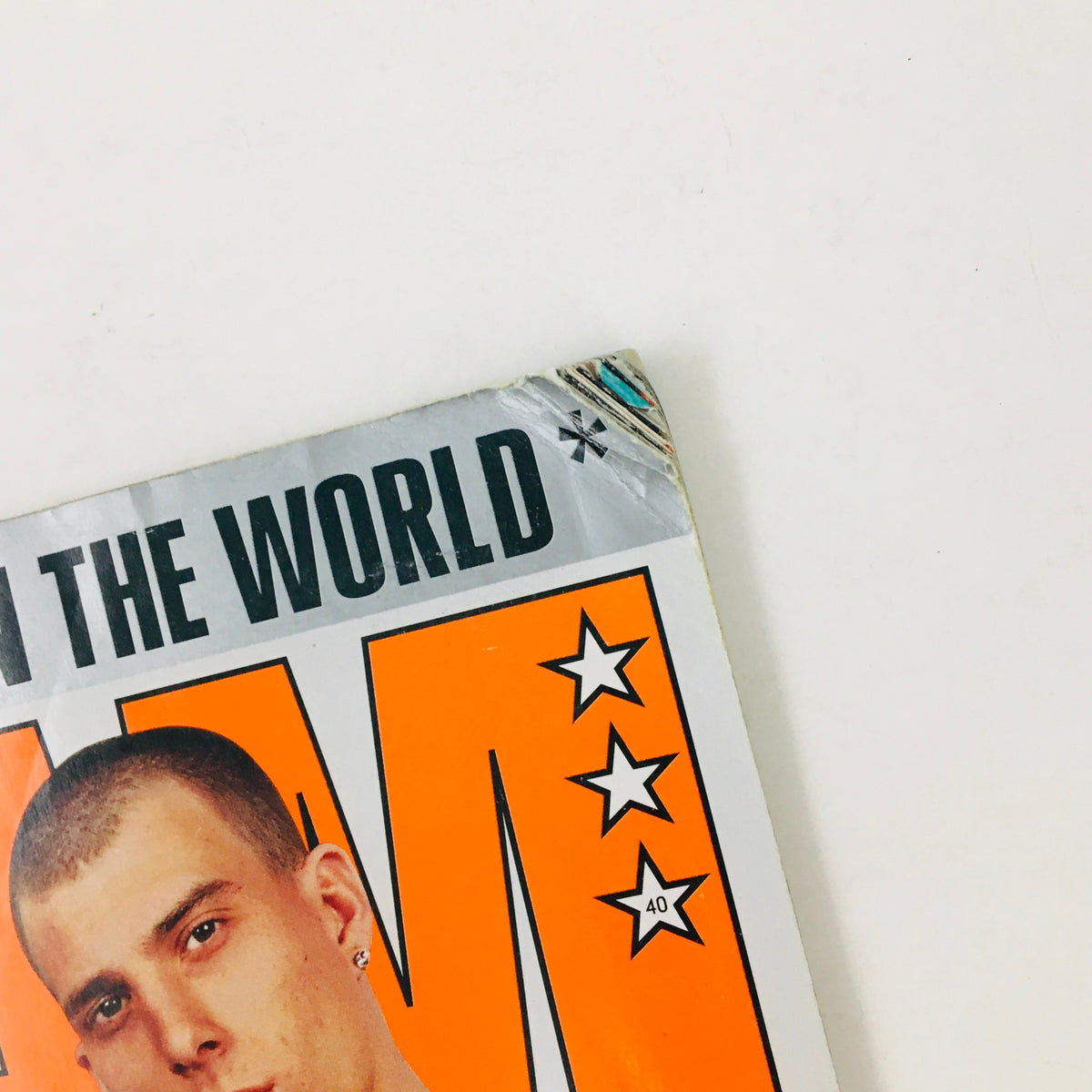 Detail view of the top corner of Slam Magazine March 2000, displaying the title 'Slam' and the star rating, emphasizing the vintage appeal of the magazine.