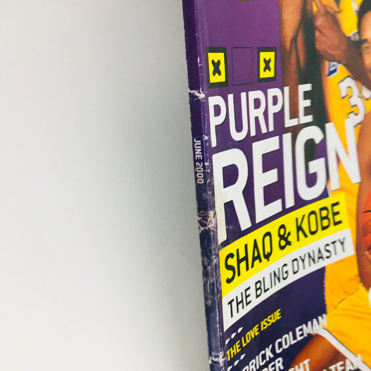 Side view of Slam Magazine June 2000, highlighting the issue's date and title, featuring Shaquille O'Neal and Kobe Bryant.