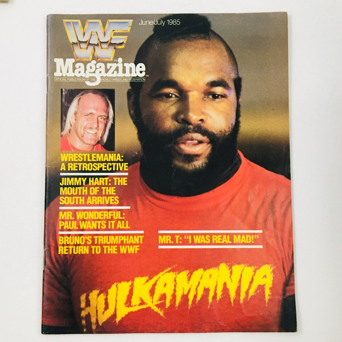 WWF Magazine June 1985 cover featuring Mr. T, Hulk Hogan, Jimmy Hart, and Bruno Sammartino, showcasing wrestling icons and iconic headlines like 'WRESTLEMANIA: A RETROSPECTIVE'.