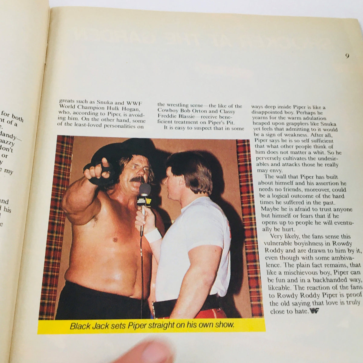 Image from WWF Magazine April 1985 depicting Black Jack speaking to Rowdy Roddy Piper during an interview segment.