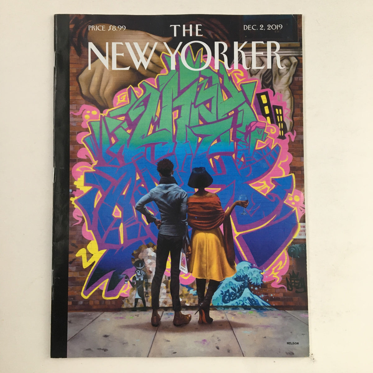 The New Yorker December 9 2019 Full Magazine Theme Cover by Kadir Nelson featuring vibrant street art and two figures observing the artwork, showcasing cultural themes.