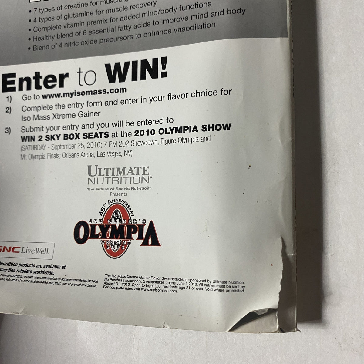 Back cover of Muscle & Fitness Magazine August 2010 with a call to action for entering the Olympia Show contest.