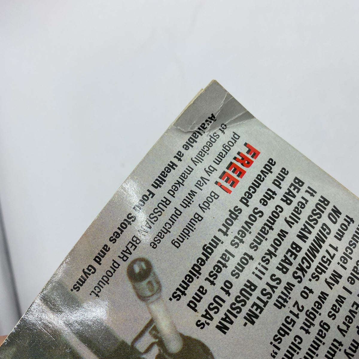 Close-up of the Iron Man Magazine April 2002, highlighting additional bodybuilding advice and promotional materials for health products, enhancing the magazine's appeal to fitness enthusiasts.