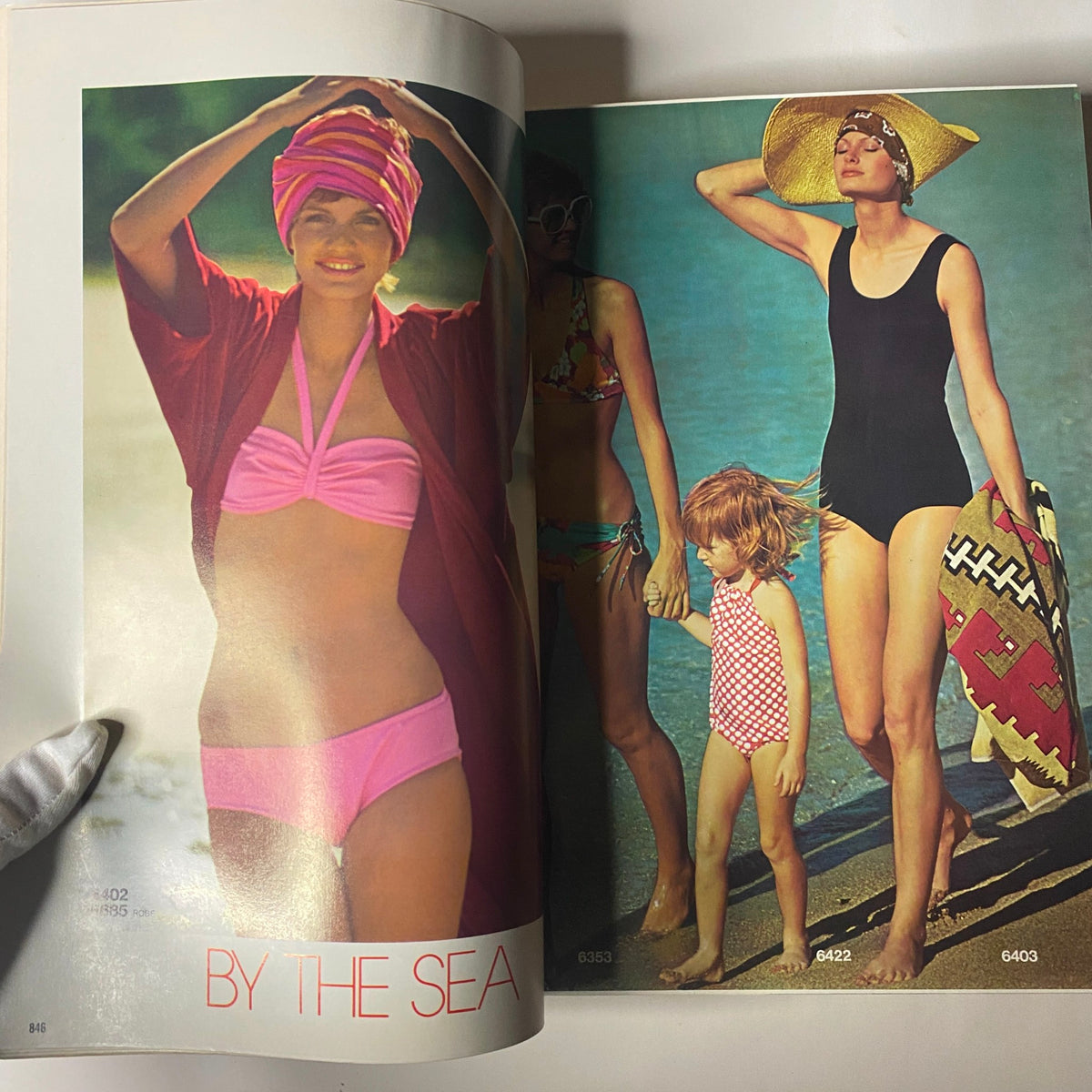 1974 June Simplicity Catalog showcases beachwear styles, featuring swimsuits and cover-ups ideal for summer vacations.