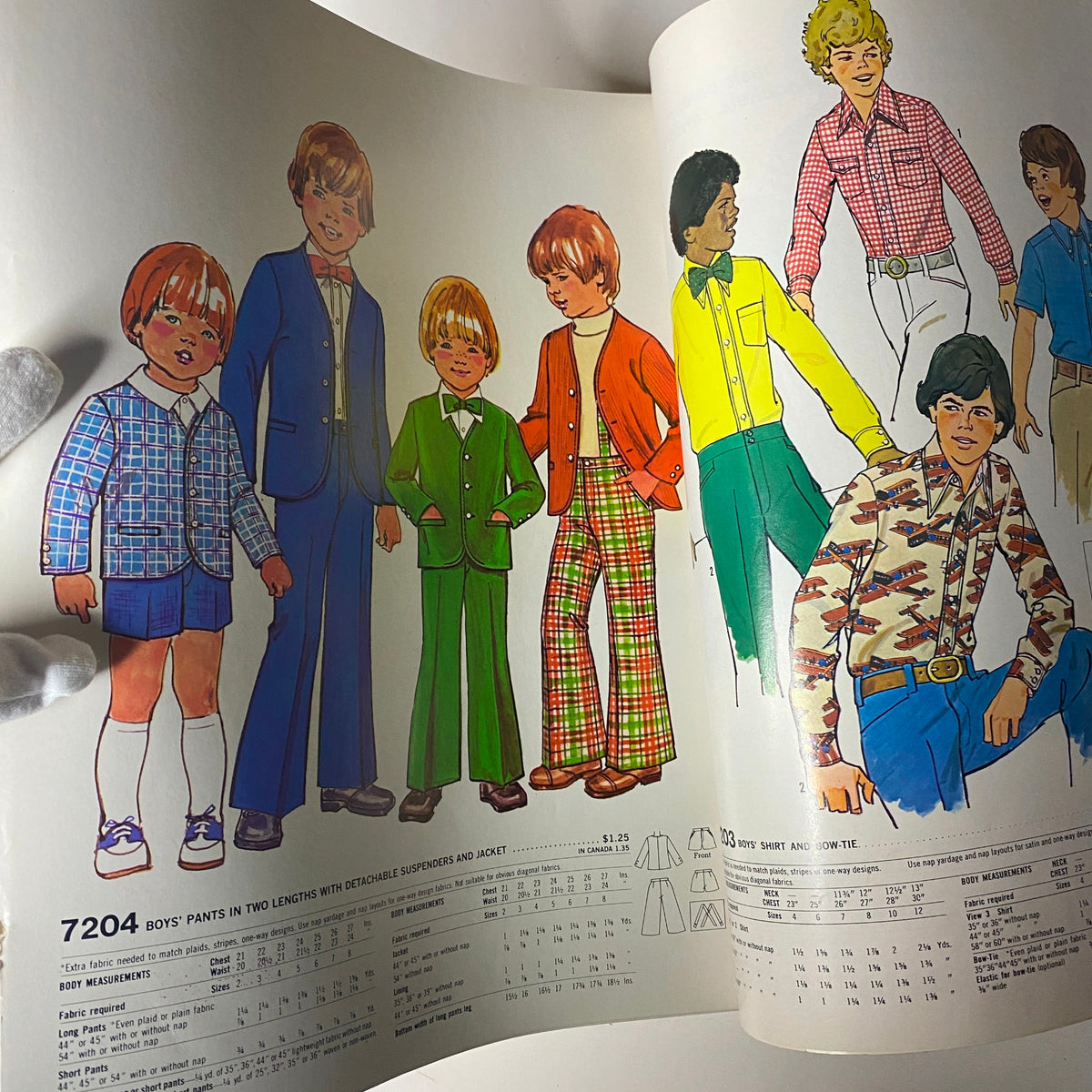 1975 November Simplicity Catalog showcasing vintage boys' fashion patterns, featuring colorful outfits including shorts and suits, ideal for home sewers and fashion enthusiasts.