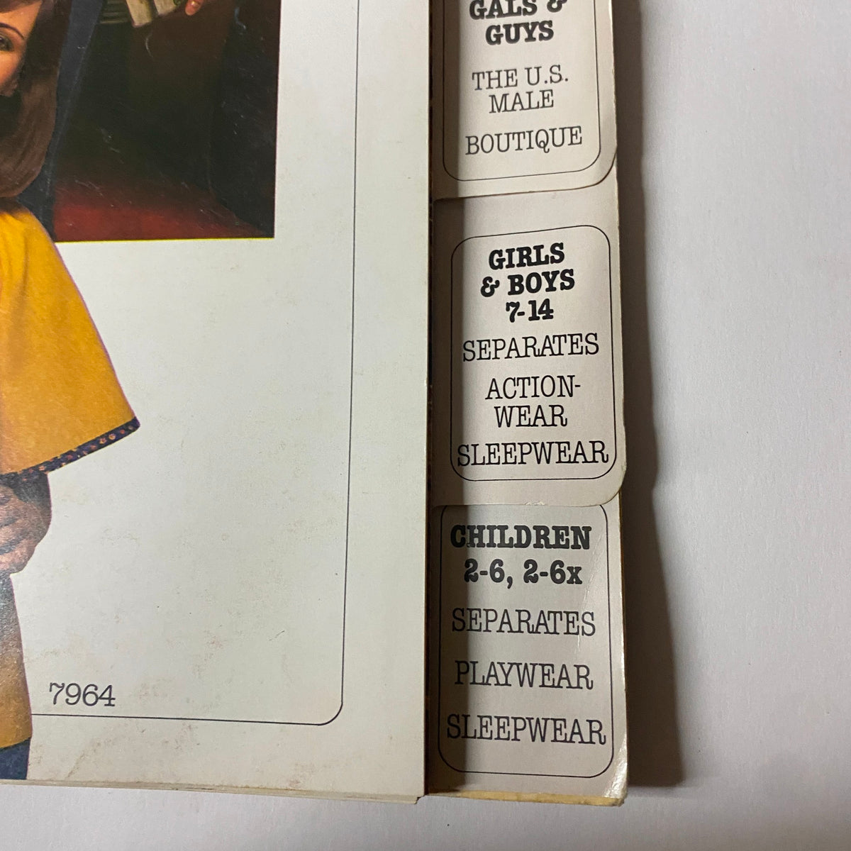 Another page from the 1977 Simplicity Fall Catalog featuring sections for 'Gals & Guys,' 'Girls & Boys 7-14,' and 'Children 2-6, 2-6x' patterns.