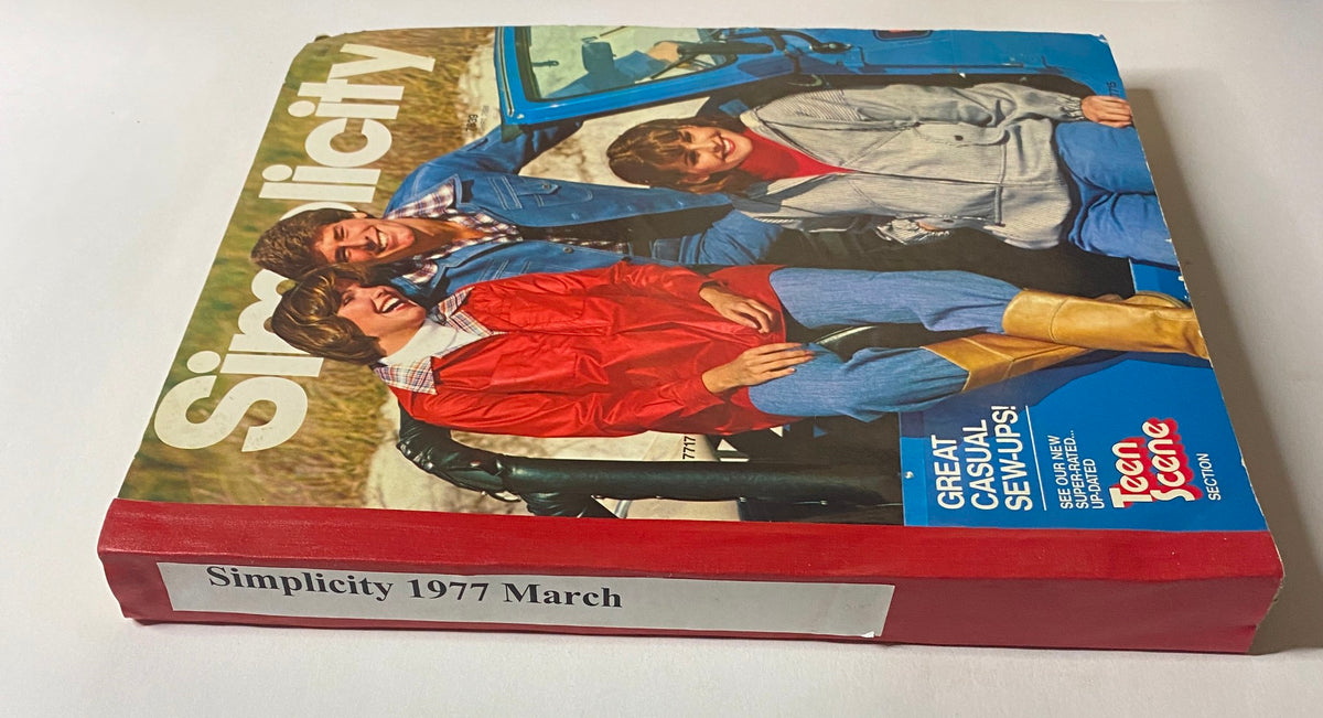 1977 March Simplicity Sewing Pattern Catalog featuring a horizontal view of the cover, highlighting casual sewing patterns with models in trendy attire against a blue jeep backdrop.