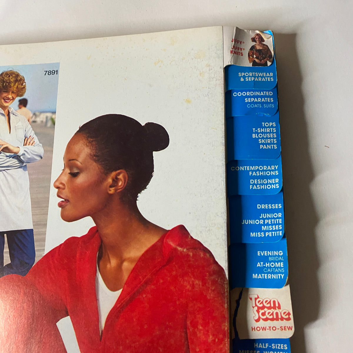 1977 March Simplicity Sewing Pattern Catalog detail view, emphasizing the section tabs for contemporary and casual patterns, reflecting the fashion and lifestyle of the 1970s.