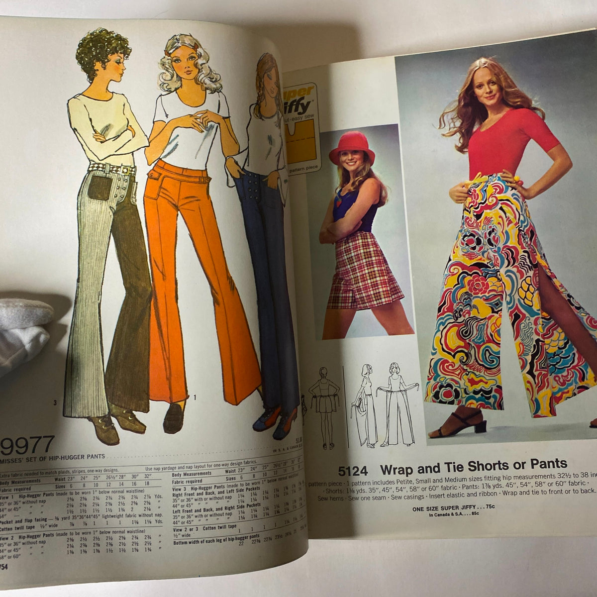 1970s May Simplicity Sewing Pattern Catalog illustrating fashionable misses' clothing, including hip-hugger pants and trendy tops.