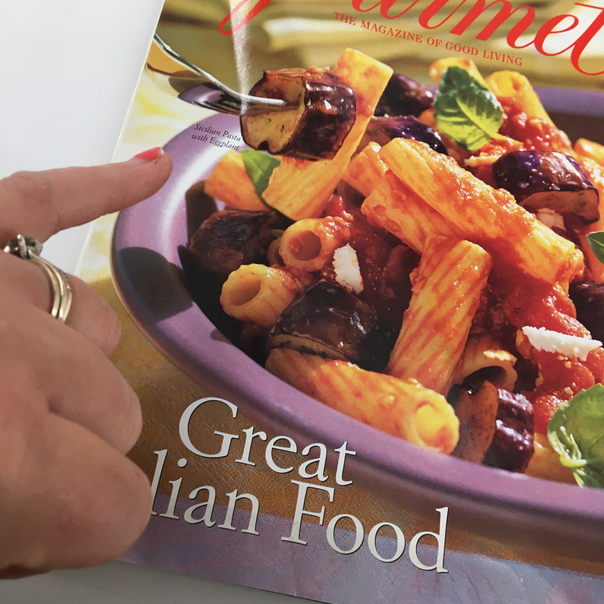 Gourmet Magazine April 1999 cover detail showing a close-up of the title 'Primavera Sunny Flavors of Sicily' and a hand pointing to the Sicilian pasta dish, highlighting 'Great Italian Food'.