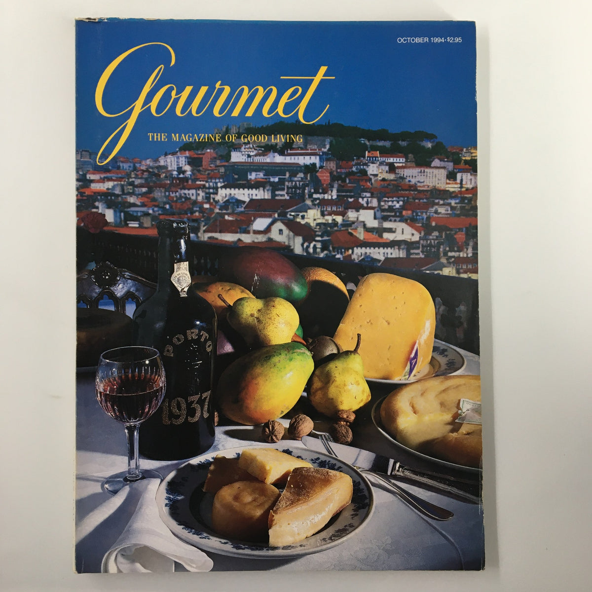 Gourmet Magazine October 1994 cover featuring a still life of fruits, cheese, and a bottle of Port wine against a scenic background of Lisbon, titled 'Gourmet: The Magazine of Good Living'.