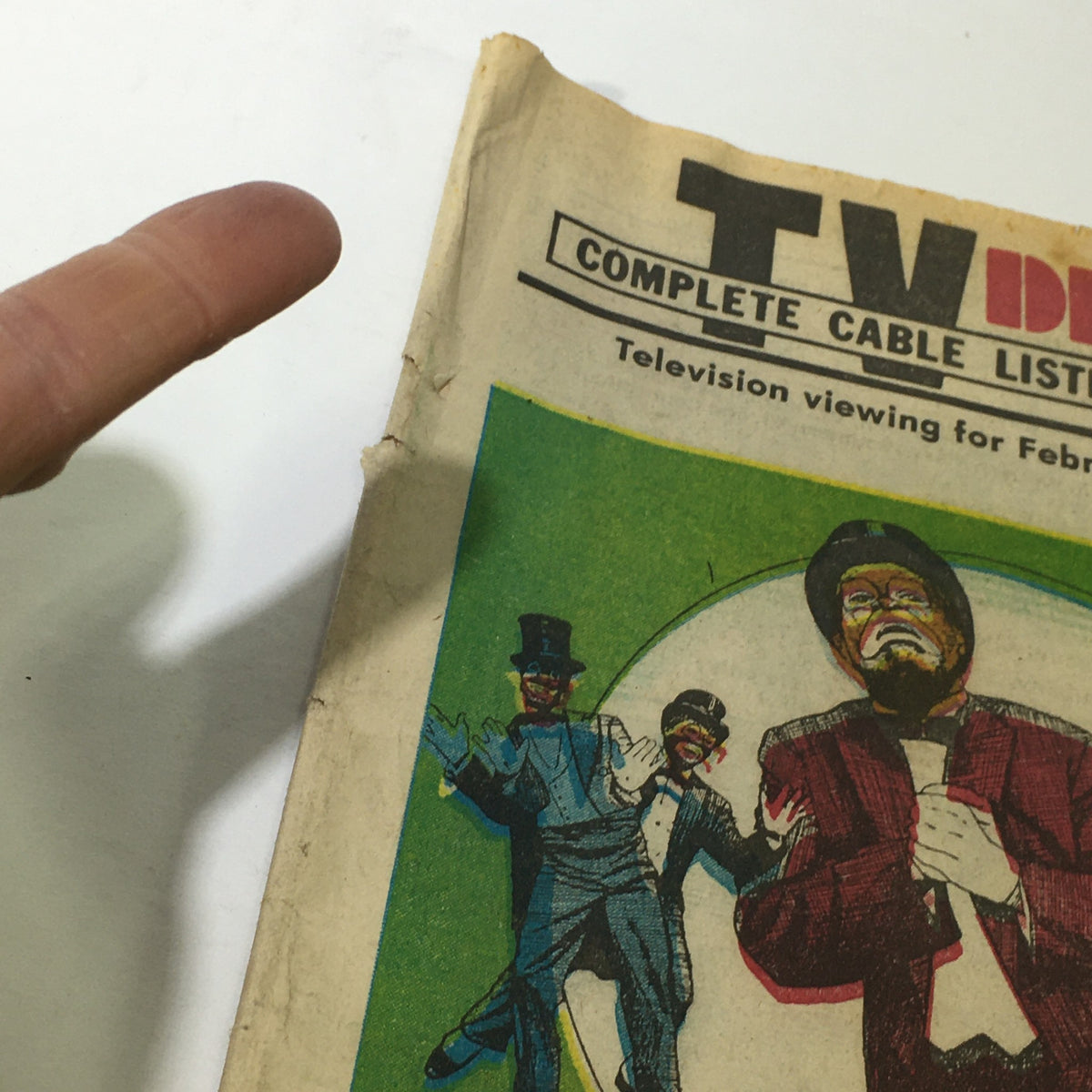 VTG TV Dial Complete Cable Listings February 19-26 1977 Minstrel Man CBS Special cover showing colorful illustrations of performers in theatrical attire, along with a hand pointing to the title.