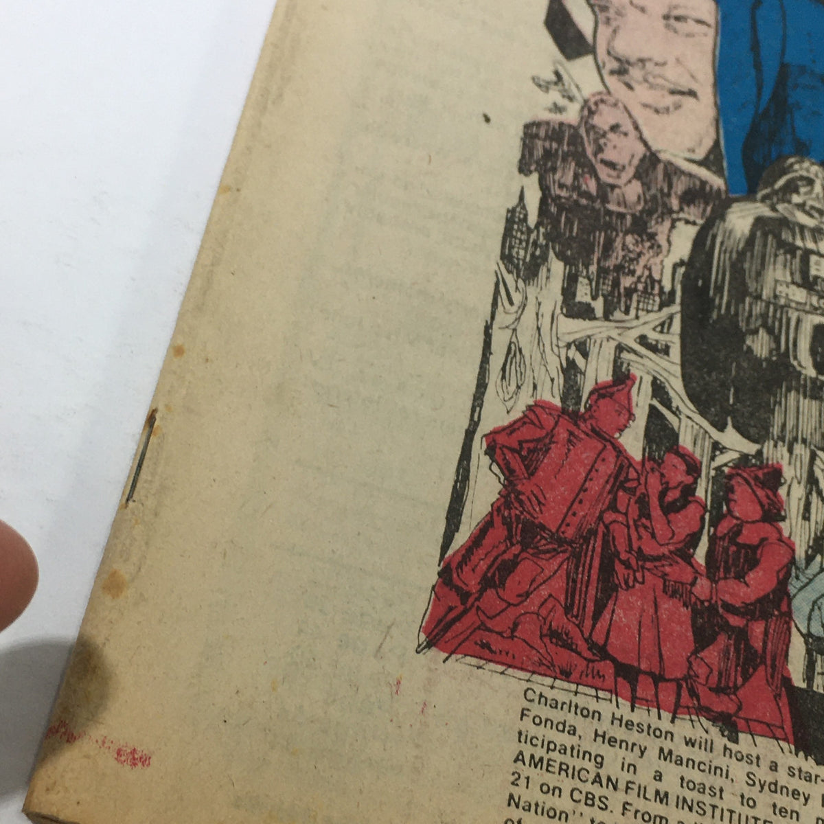 Detail shot of the VTG TV Dial Complete Cable Listings November 19-26 1977, highlighting the illustration featuring Charlton Heston and film characters.