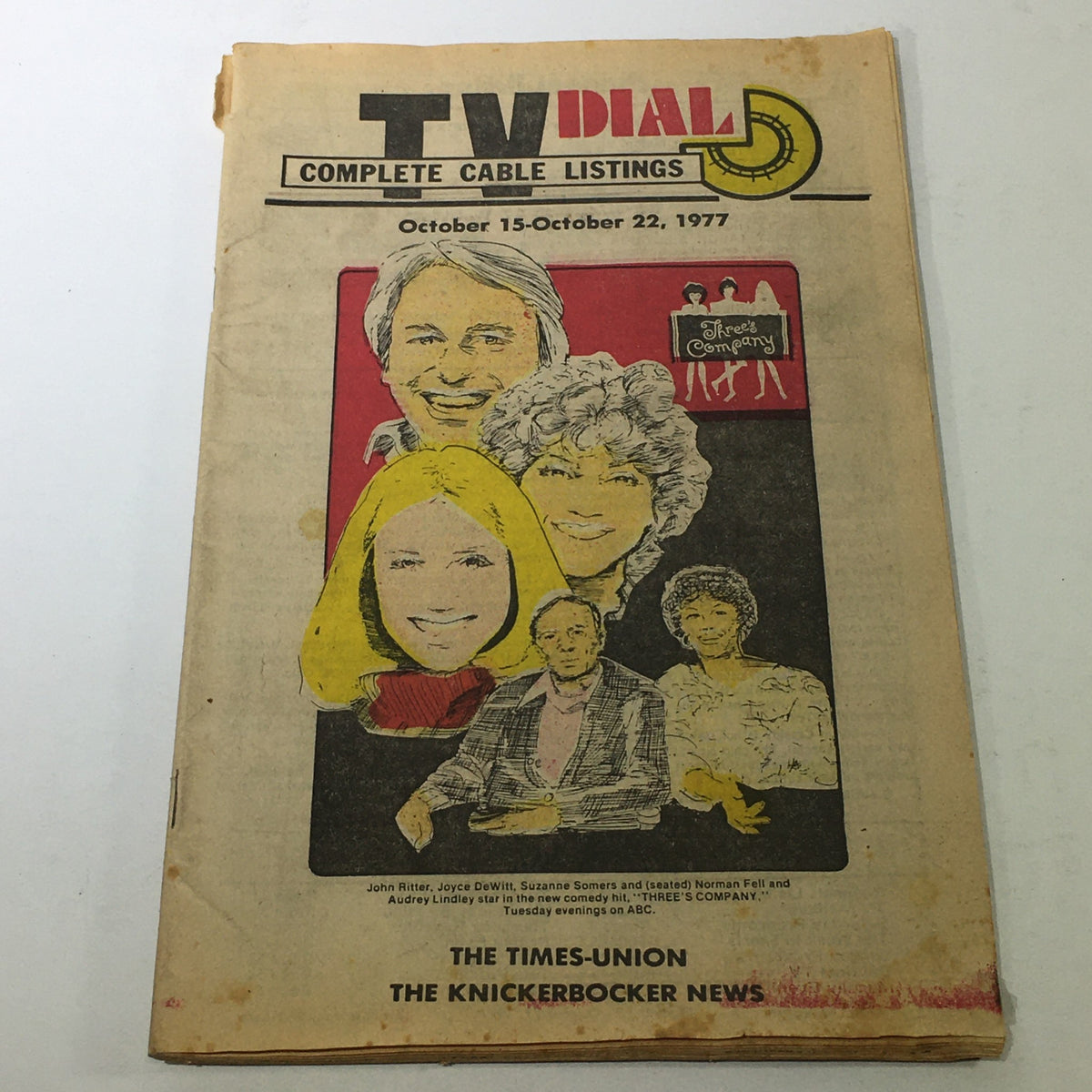 VTG TV Dial Complete Cable Listings October 15-22 1977 featuring the characters from Three's Company on ABC, showcasing vintage magazine cover art with colorful illustrations of the main cast.