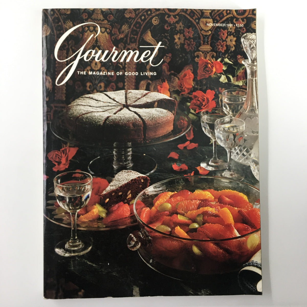 Gourmet Magazine November 1991 cover featuring an elegant dessert table with a chocolate cake and fruit salad, celebrating gourmet dining during the holidays in Southern Ontario.