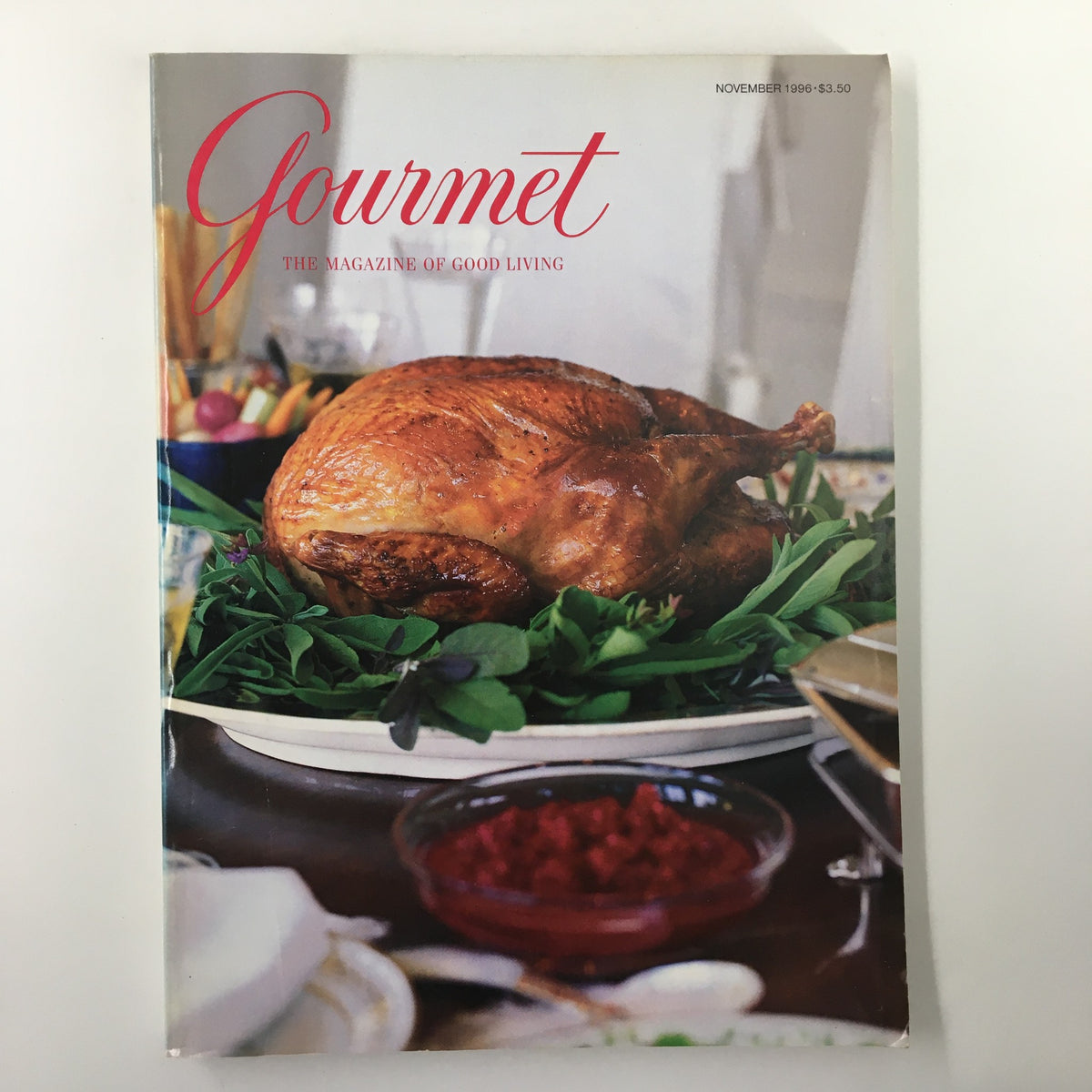 Cover of Gourmet Magazine from November 1996 featuring a beautifully roasted turkey on a platter surrounded by greenery, ideal for Thanksgiving dinner.