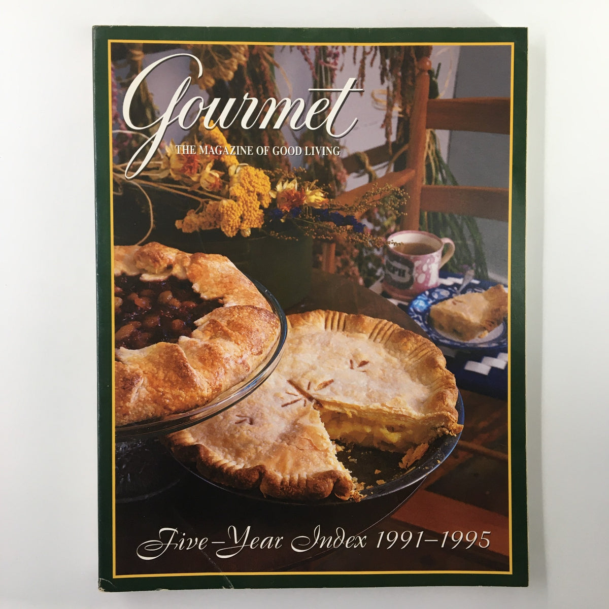 Cover of Gourmet Magazine A Five Year Index of Editorial From 1991-1995, featuring a pie and rich floral backdrop, emphasizing culinary elegance.