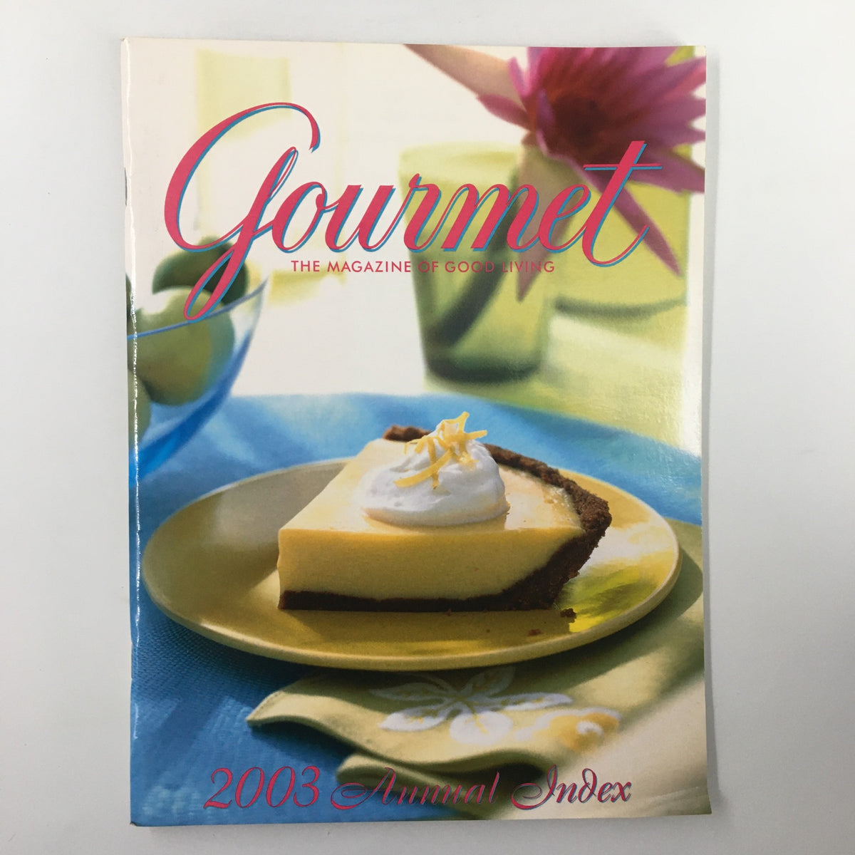 Cover of Gourmet Magazine January-December 2003 featuring the Annual Recipe Index, showcasing a slice of cheesecake on a plate with a floral backdrop.