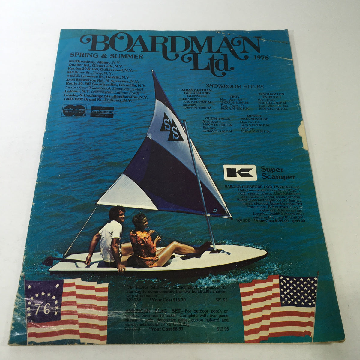 Cover of VTG Boardman Ltd. Price Guide Catalog Spring & Summer 1976 featuring a sailboat scene with two people and American flags.
