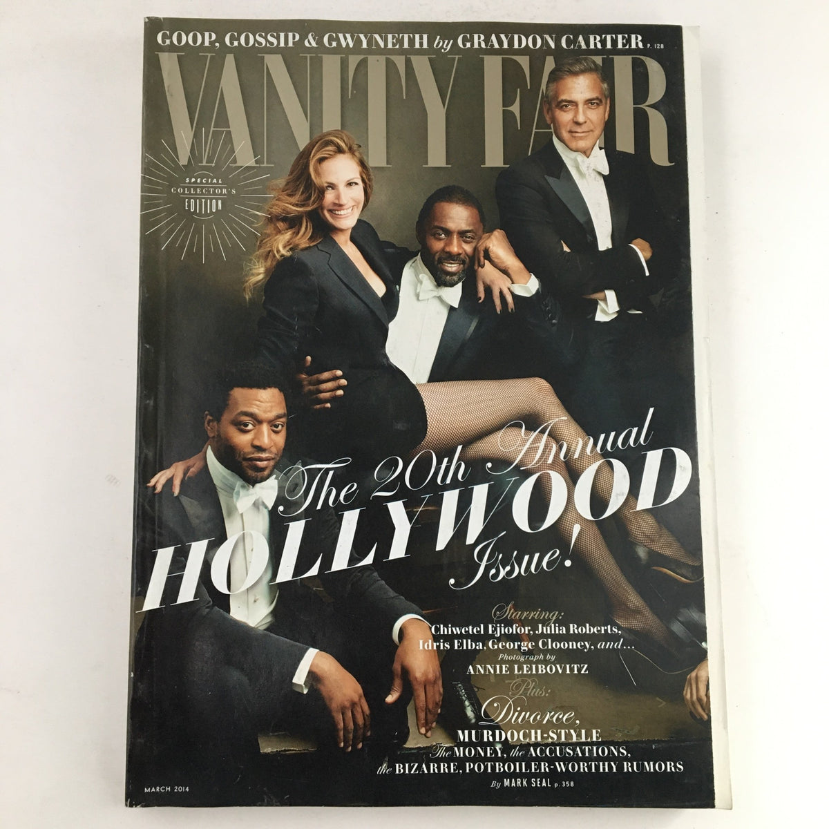 Cover of Vanity Fair Magazine March 2014 featuring Idris Elba, Julia Roberts, and George Clooney in a stylish pose, highlighting the 20th Annual Hollywood Issue.