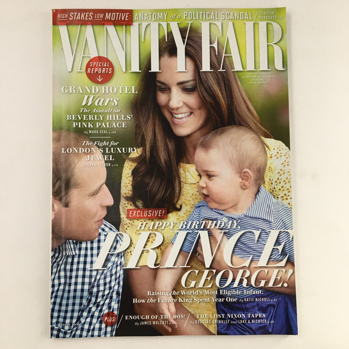 Vanity Fair Magazine August 2014 featuring Prince William, Kate Middleton, and baby Prince George on the cover. A collectible vintage magazine showcasing royal family moments and culture.