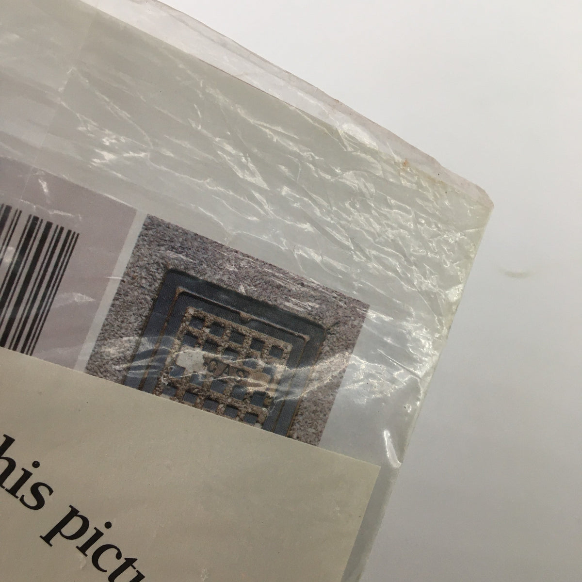 Detail of the sealed packaging of the Gourmet Magazine August 2004 Black Berry Jam Summer Reading Issue, revealing minor wear but maintaining the pristine condition of the magazine inside.