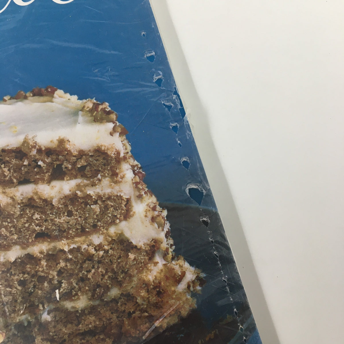Side view of the Gourmet Magazine April 2007 cover, showing minor wear on the plastic wrapping while displaying the cake prominently.