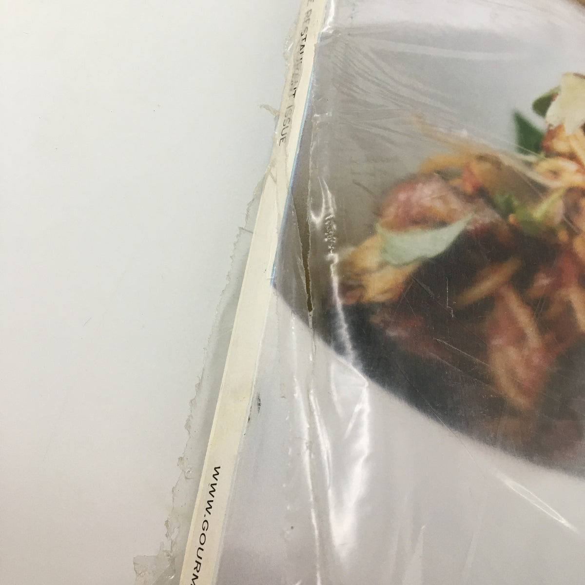 Close-up view of a sealed Gourmet Magazine from October 2007, showcasing a vibrant dish and revealing the magazine's protective plastic covering.